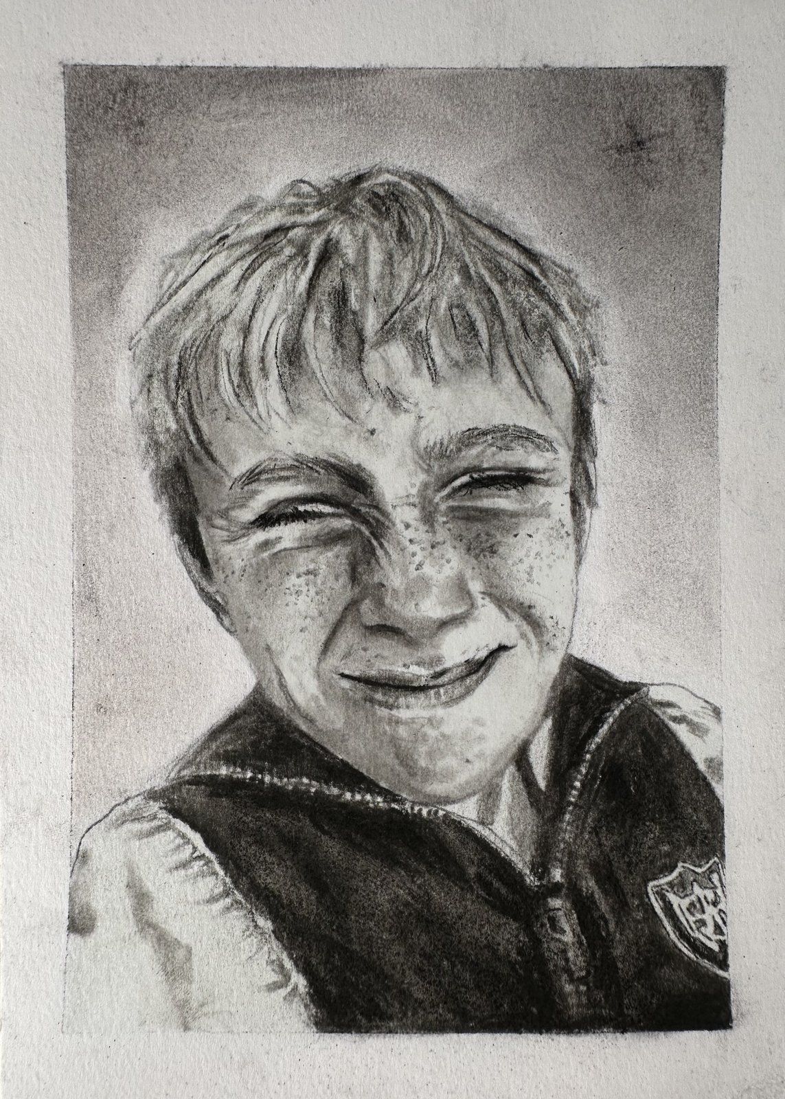 Freckled Joy — smiling boy