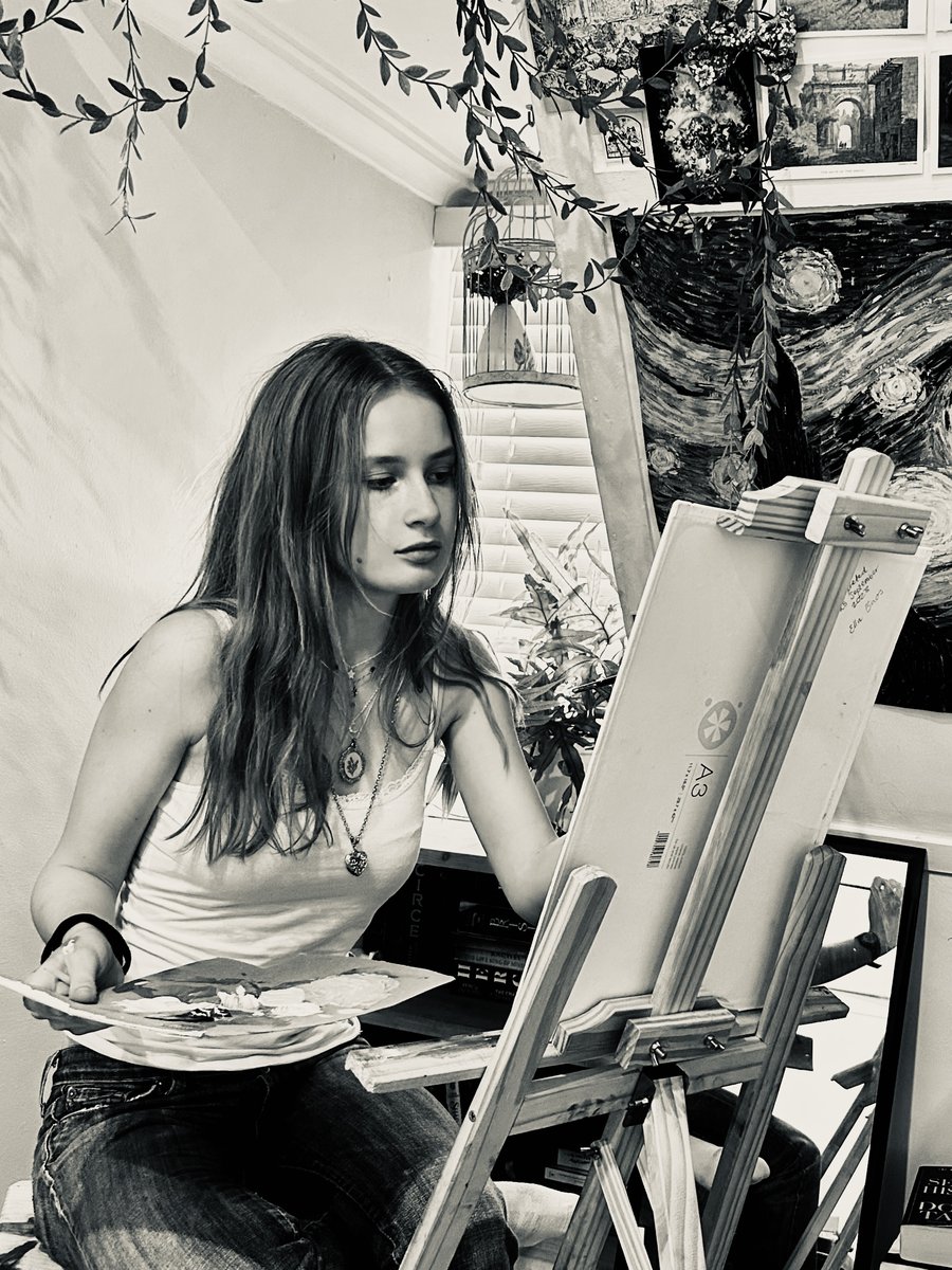 Ella — charcoal artist at her easel